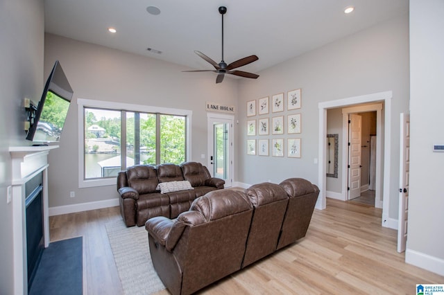 90 Landing Chase, Wedowee, AL 36278 - living area featuring ceiling fan, light wood finished floors, a fireplace with flush hearth, recessed lighting, and baseboards