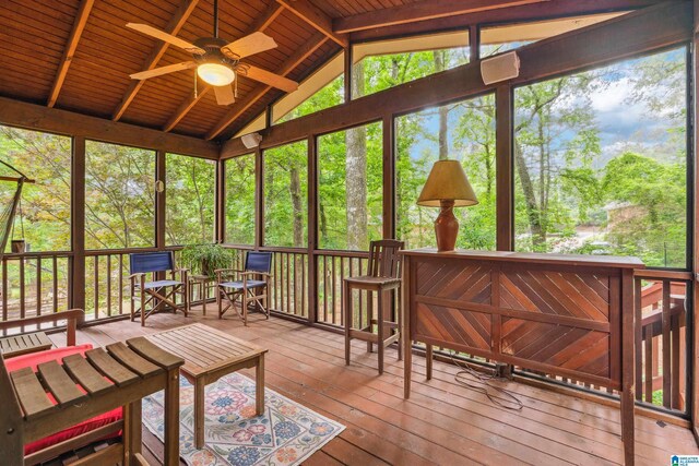 sunroom featuring ceiling fan