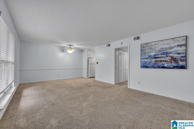 2825 Highland Ave S Unit 1, Birmingham, AL 35205 - empty room with light colored carpet, a ceiling fan, and baseboards