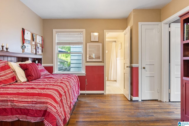 117 Morris Blvd, Homewood, AL 35209 - bedroom with dark wood-style flooring and baseboards