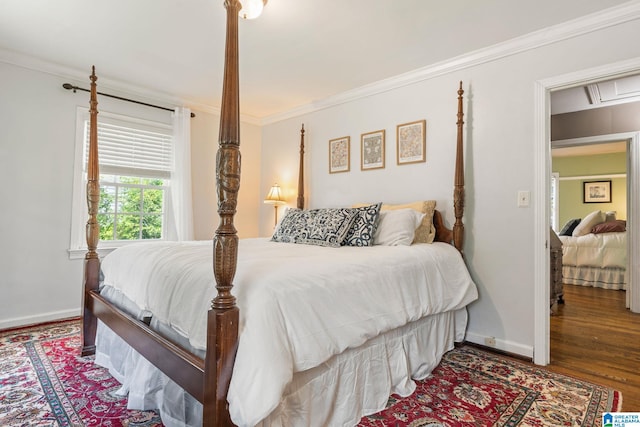 117 Morris Blvd, Homewood, AL 35209 - bedroom featuring ornamental molding, baseboards, and wood finished floors