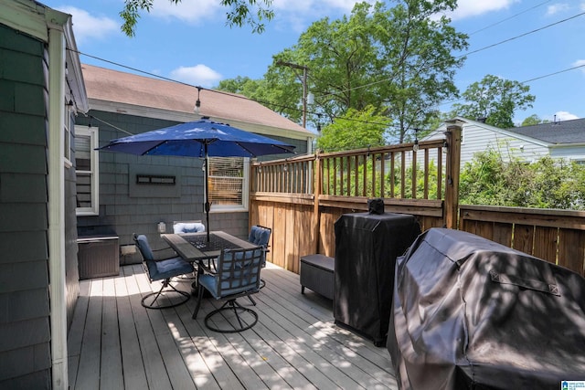 117 Morris Blvd, Homewood, AL 35209 - wooden terrace with a grill and outdoor dining space
