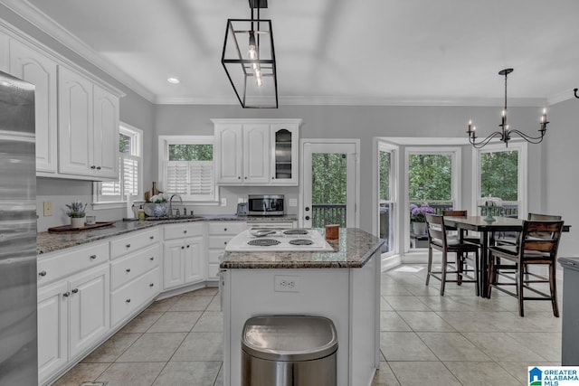 1408 W Acorn Way, Mount Olive, AL 35117 - kitchen with light tile patterned flooring, a chandelier, stainless steel appliances, a sink, and ornamental molding