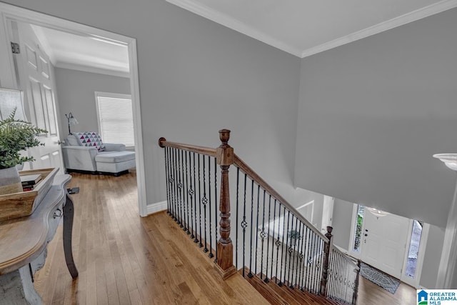 1408 W Acorn Way, Mount Olive, AL 35117 - hallway with wood-type flooring, crown molding, an upstairs landing, and baseboards