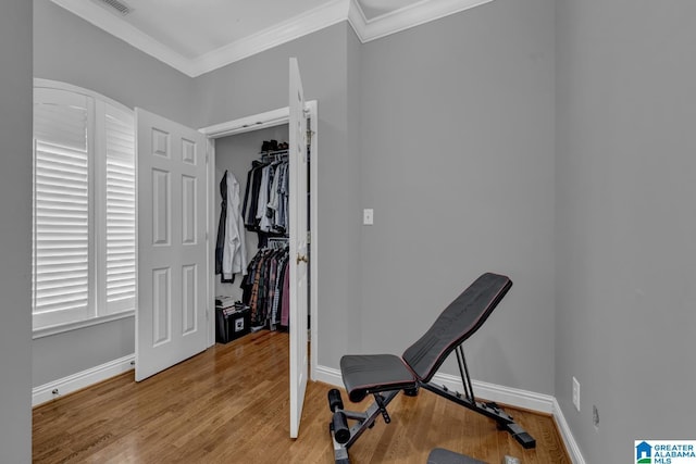 1408 W Acorn Way, Mount Olive, AL 35117 - workout room with light wood-style flooring, baseboards, and ornamental molding