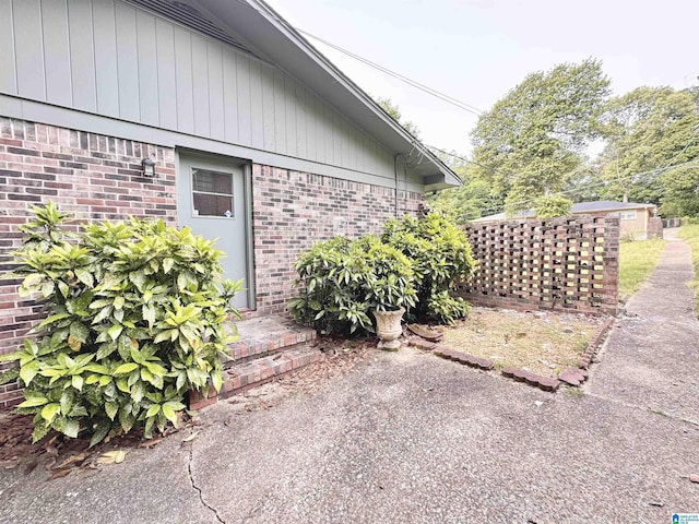 view of home's exterior featuring brick siding