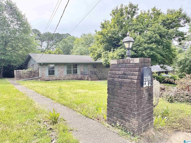 view of front facade with a front lawn