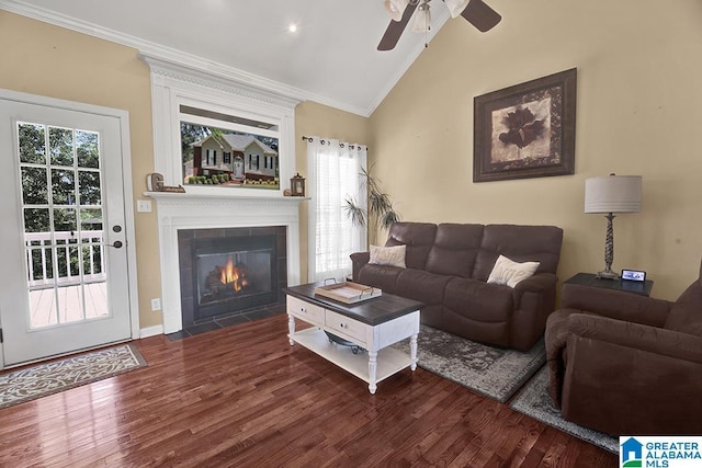 201 Paw Path Ln, Blountsville, AL 35031 - living area featuring crown molding, vaulted ceiling, wood finished floors, a ceiling fan, and a tile fireplace