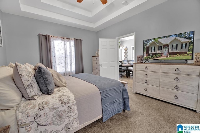 201 Paw Path Ln, Blountsville, AL 35031 - bedroom featuring carpet, a tray ceiling, and ceiling fan