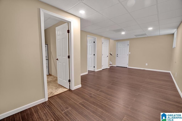 201 Paw Path Ln, Blountsville, AL 35031 - unfurnished room featuring wood finished floors, baseboards, and a paneled ceiling