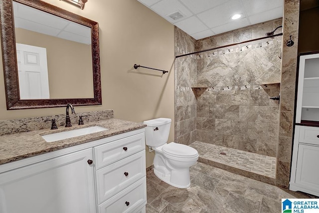 201 Paw Path Ln, Blountsville, AL 35031 - bathroom featuring vanity, a tile shower, toilet, and recessed lighting