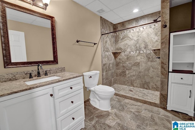 201 Paw Path Ln, Blountsville, AL 35031 - bathroom featuring vanity, toilet, tiled shower, recessed lighting, and a drop ceiling