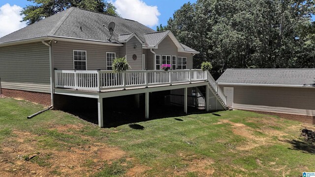 201 Paw Path Ln, Blountsville, AL 35031 - rear view of house with a wooden deck, a lawn, and roof with shingles