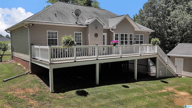 201 Paw Path Ln, Blountsville, AL 35031 - rear view of house featuring a deck, a lawn, and roof with shingles