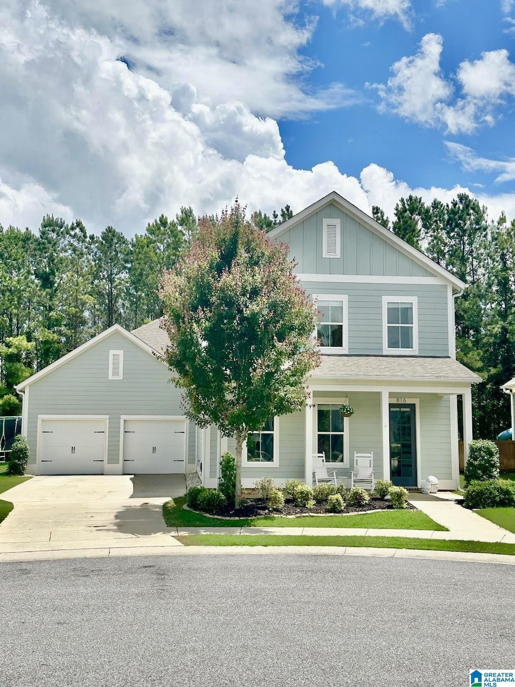 816 Rosebury Rd, Helena, AL 35080 - view of front of home featuring concrete driveway, an attached garage, and board and batten siding