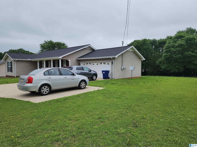 view of home's exterior featuring a garage, concrete driveway, a yard, and a shingled roof