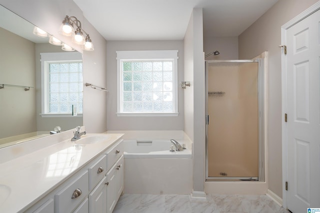 306 Saint Charles Way, Helena, AL 35080 - bathroom featuring marble look tile flooring, a stall shower, a garden tub, and vanity