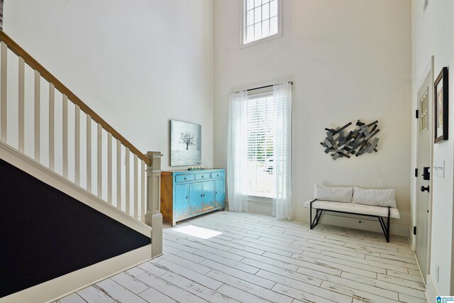 2126 Raines Run, Birmingham, AL 35242 - foyer with a towering ceiling, stairway, and light wood-style flooring