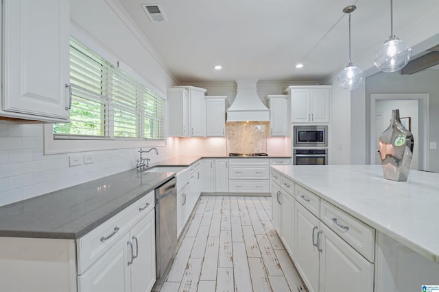 2126 Raines Run, Birmingham, AL 35242 - kitchen with appliances with stainless steel finishes, custom exhaust hood, a sink, tasteful backsplash, and recessed lighting