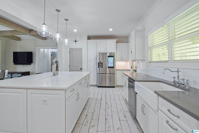 2126 Raines Run, Birmingham, AL 35242 - kitchen with appliances with stainless steel finishes, white cabinetry, a sink, pendant lighting, and light stone counters