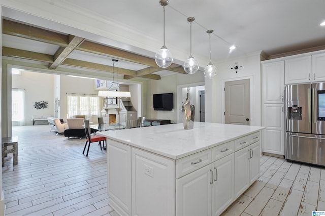 2126 Raines Run, Birmingham, AL 35242 - kitchen with stainless steel fridge, open floor plan, beamed ceiling, light wood-type flooring, and white cabinets
