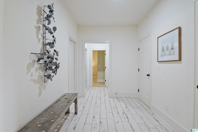 2126 Raines Run, Birmingham, AL 35242 - hallway with light wood-type flooring and baseboards