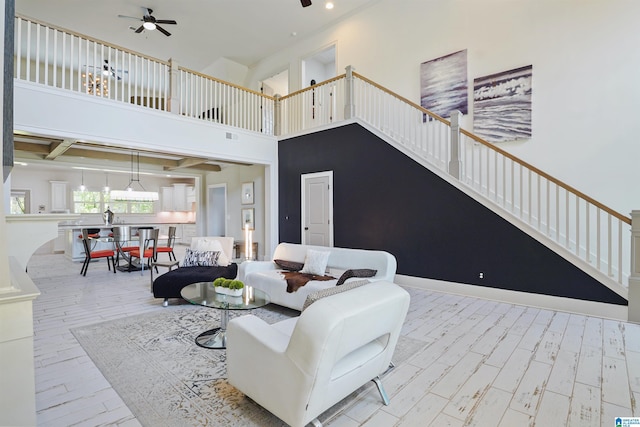 2126 Raines Run, Birmingham, AL 35242 - living area featuring ceiling fan, wood finished floors, stairway, a towering ceiling, and recessed lighting