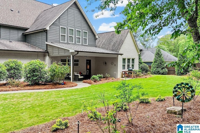 2126 Raines Run, Birmingham, AL 35242 - back of property with a lawn, brick siding, and roof with shingles