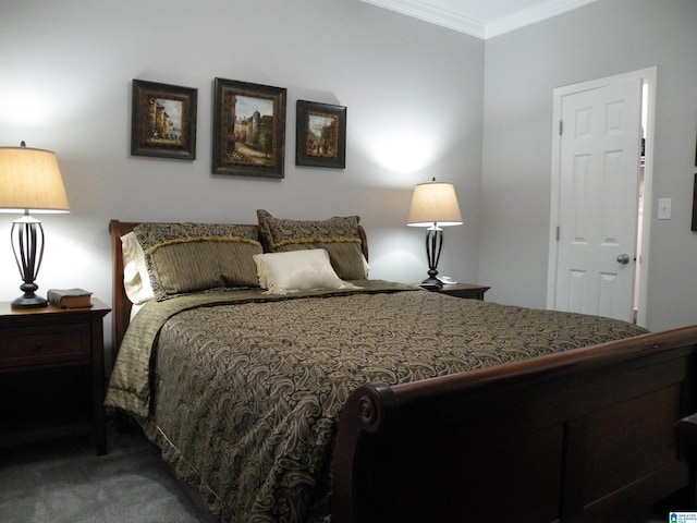 carpeted bedroom featuring crown molding
