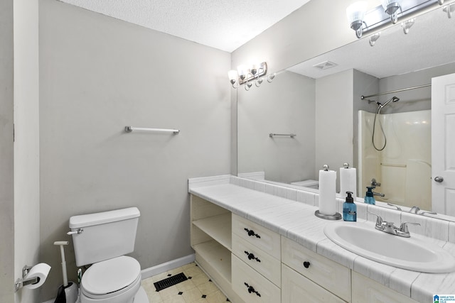 5826 Willow Crest Dr, Pinson, AL 35126 - full bath with toilet, a shower, vanity, baseboards, and a textured ceiling