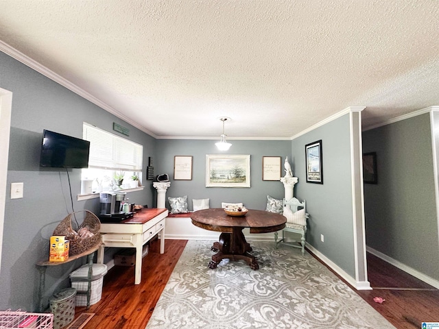 18981 Remlap Dr, Remlap, AL 35133 - dining room with wood finished floors, ornamental molding, and a textured ceiling