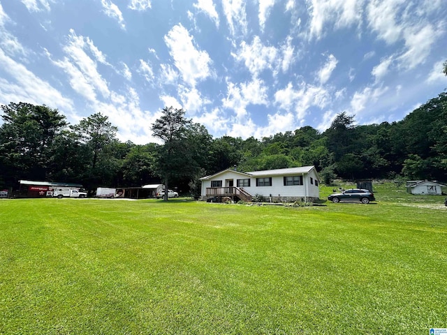 18981 Remlap Dr, Remlap, AL 35133 - view of green lawn featuring a wooded view