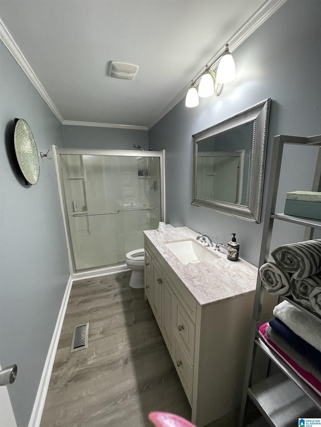 18981 Remlap Dr, Remlap, AL 35133 - full bath featuring crown molding, a shower stall, toilet, wood finished floors, and vanity