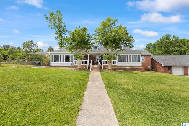 390 Chamblee Ln, Warrior, AL 35180 - view of front of property with brick siding, a porch, and roof with shingles