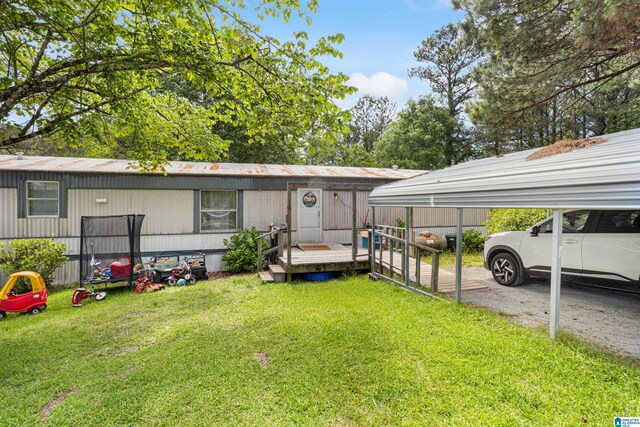 390 Chamblee Ln, Warrior, AL 35180 - view of front of property with a front lawn and a detached carport