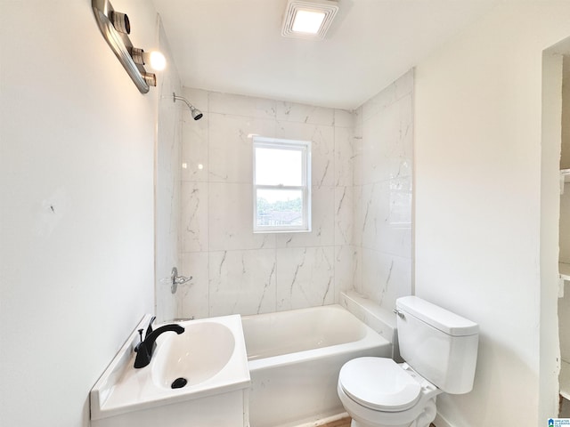 bathroom with toilet, a sink, and shower / tub combination