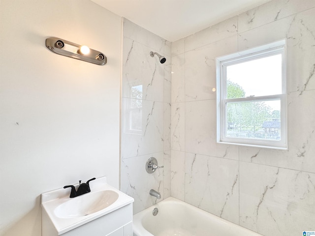 full bath featuring vanity and  shower combination