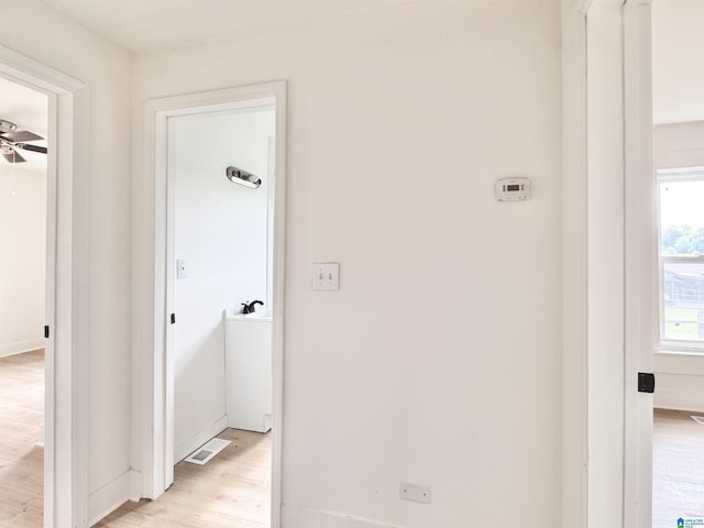 hallway featuring light wood-type flooring