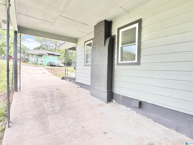 view of patio with an attached carport