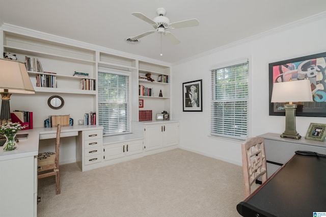 1209 29th St S, Birmingham, AL 35205 - home office with ceiling fan, built in desk, crown molding, light carpet, and plenty of natural light