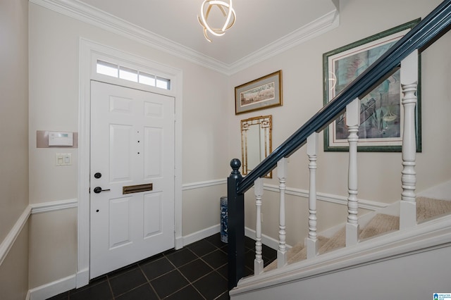 1209 29th St S, Birmingham, AL 35205 - foyer featuring ornamental molding, baseboards, dark tile patterned floors, and stairs