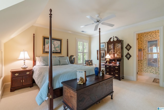 bedroom featuring light carpet, baseboards, crown molding, ceiling fan, and ensuite bath