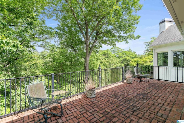 view of patio / terrace featuring a balcony