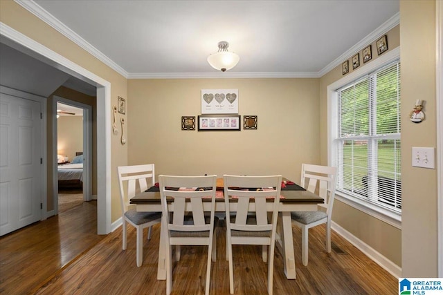 110 Drexal Dr, Oneonta, AL 35121 - dining space featuring wood finished floors, baseboards, and crown molding