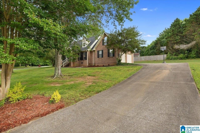 110 Drexal Dr, Oneonta, AL 35121 - view of side of home featuring brick siding, asphalt driveway, crawl space, and a garage