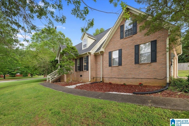 110 Drexal Dr, Oneonta, AL 35121 - view of property exterior with brick siding and a lawn