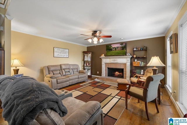 110 Drexal Dr, Oneonta, AL 35121 - living area featuring wood finished floors, ceiling fan, ornamental molding, a fireplace, and plenty of natural light