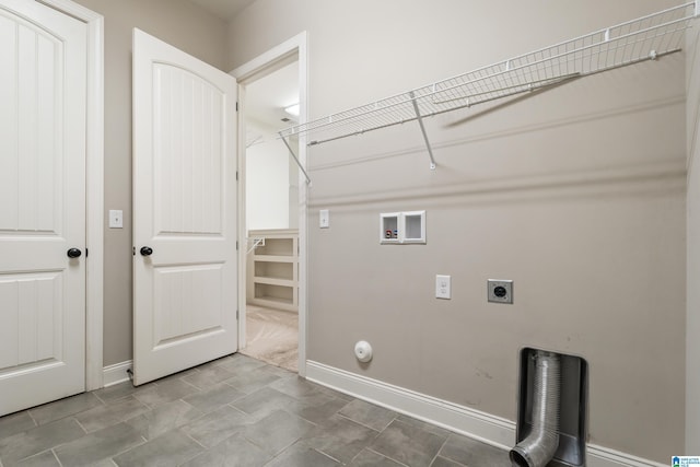 laundry room featuring hookup for a washing machine, electric dryer hookup, baseboards, and gas dryer hookup
