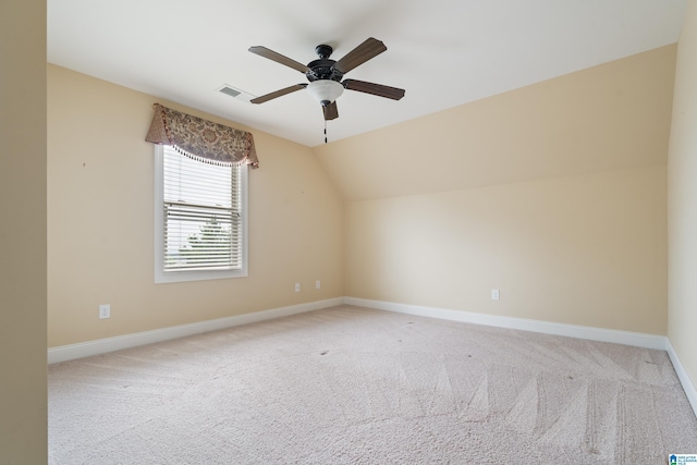 bonus room with baseboards, carpet floors, ceiling fan, and vaulted ceiling