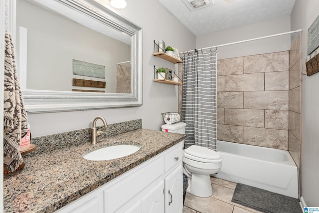 76 Pine Tree Ln, Alexandria, AL 36250 - bathroom with vanity, shower / bath combo, toilet, tile patterned floors, and a textured ceiling